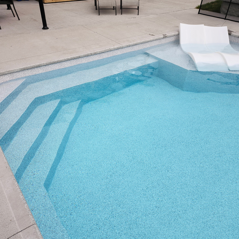 inground swimming pool with stairs