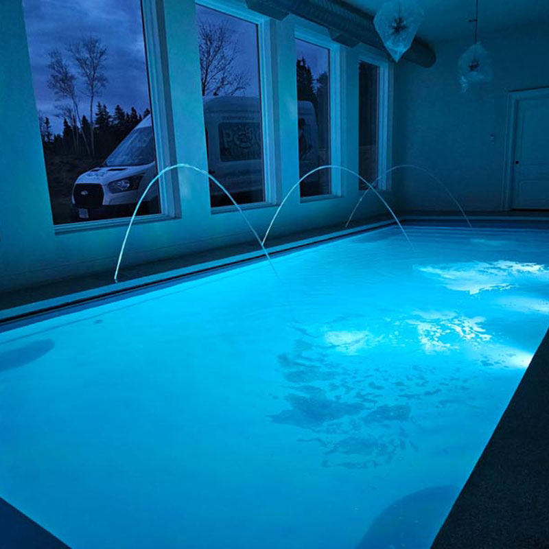 fiberglass pool with water spout feature